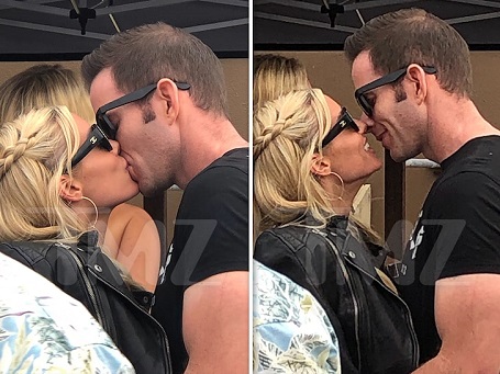 Tarek El Moussa and Heather Rae Young were spotted kissing on a yacht on July 29.